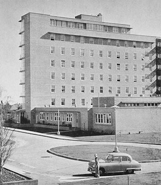 Parking was easy at the hospital in 1957. The seven-storey nurses’ home, William Pridham House, is in the background.